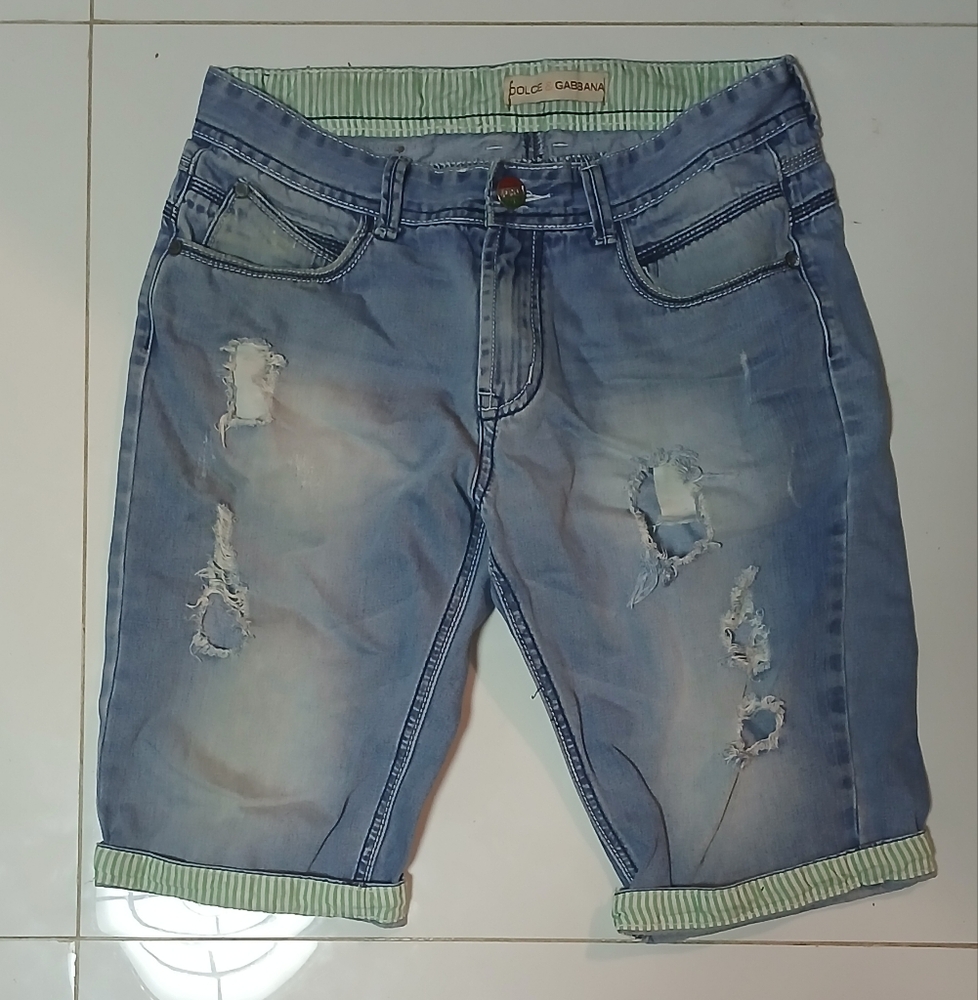 Dolce & Gabbana Distressed Blue Denim Shorts